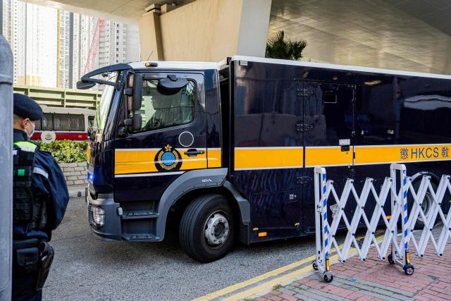 A correctional services van transporting media tycoon Jimmy Lai leaves the West Kowloon court following Lai's verdicts in his national security trial in Hong Kong on December 15, 2025. Hong Kong pro-democracy media tycoon Jimmy Lai was on December 15 found guilty on two counts of foreign collusion and of seditious publication, in one of the Chinese city's highest-profile national security trials. (Photo by Leung Man Hei / AFP)