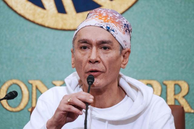 Kim Aris, son of Myanmar's deposed democratic leader Aung San Suu Kyi, speaks during a press conference at the Japan National Press Club in Tokyo on December 15, 2025. (Photo by Kazuhiro NOGI / AFP)