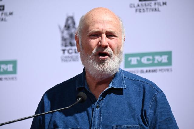 (FILES) Comedian Rob Reiner speaks at a ceremony honoring fellow actor Billy Crystal with a hand & footprint ceremony, April 12, 2019 at the TCL Chinese Theatre in Hollywood, California. US director Rob Reiner and his wife Michelle Reiner were found dead at their southern California mansion, CNN and NBC reported on December 14, 2025. Los Angeles police said in a media conference on Sunday evening they would not yet publicly confirm the identities of the two people found dead at the residence of the "When Harry Met Sally" director, and were not interviewing any suspects. (Photo by Robyn Beck / AFP)