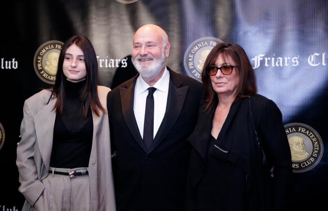 (FILES) Actor Rob Reiner (C), his wife actress Michele Reiner (R) and their daughter Rony Reiner attend the Friars Club Entertainment Icon Award ceremony at the Ziegfeld Ballroom on November 12, 2018, in New York City. US director Rob Reiner and his wife Michele Reiner were found dead at their southern California mansion, CNN and NBC reported on December 14, 2025. Los Angeles police said in a media conference on Sunday evening they would not yet publicly confirm the identities of the two people found dead at the residence of the "When Harry Met Sally" director, and were not interviewing any suspects. (Photo by KENA BETANCUR / AFP)