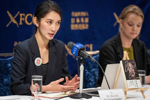 Journalist and Director Shiori Ito speaks during a press conference following a press screening event of the film "Black Box Diaries" in Tokyo on December 15, 2025. (Photo by Yuichi YAMAZAKI / AFP)
