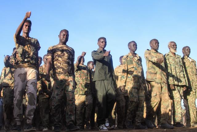 The authorities of the capital, Khartoum, are deploying thousands of soldiers in the Umbada locality west of Omdurman after they completed training courses, with the aim of supporting the Sudanese army on the battlefronts on December 15, 2025.  (Photo by Ebrahim Hamid / AFP)