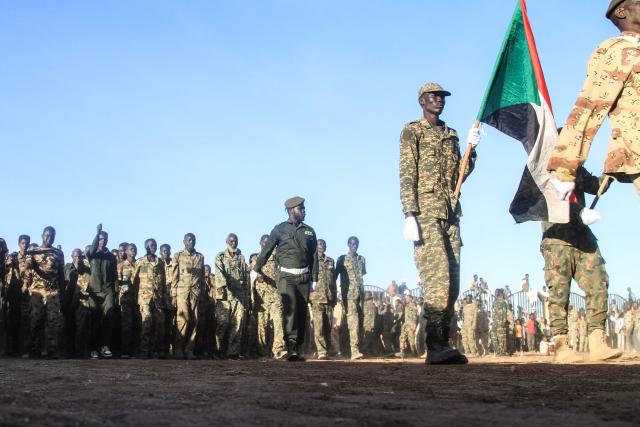 The authorities of the capital, Khartoum, are deploying thousands of soldiers in the Umbada locality west of Omdurman after they completed training courses, with the aim of supporting the Sudanese army on the battlefronts on December 15, 2025.  (Photo by Ebrahim Hamid / AFP)