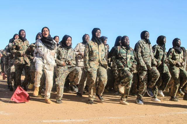 The authorities of the capital, Khartoum, are deploying thousands of soldiers in the Umbada locality west of Omdurman after they completed training courses, with the aim of supporting the Sudanese army on the battlefronts on December 15, 2025.  (Photo by Ebrahim Hamid / AFP)