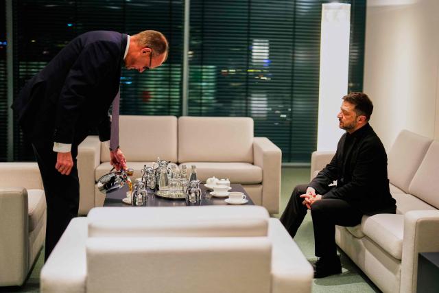 German Chancellor Friedrich Merz and Ukraine's President Volodymyr Zelensky hold talks at the Chancellery in Berlin on December 15, 2025. Ukrainian President Zelensky travelled to Berlin to meet European leaders as well as the US President's envoy, heads of the EU and of the NATO for talks on how to end the grinding war with Russia. (Photo by Markus Schreiber / POOL / AFP)