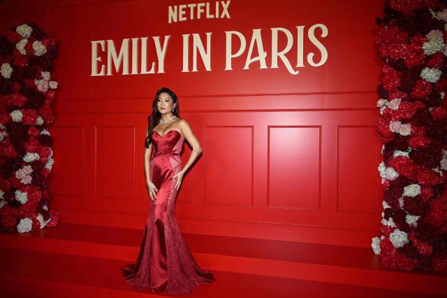 US actress Ashley Park poses during the avant-premiere of TV serie "Emily in Paris" season 5, at the Grand Rex, in Paris on December 15, 2025. (Photo by Blanca CRUZ / AFP)
