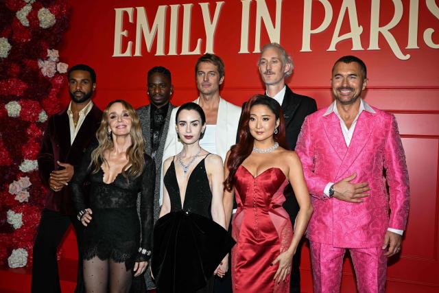 (From L) British actor Lucien Laviscount, French actress Philippine Leroy-Beaulieu, French actor Samuel Arnold, US actress Lily Collins, French actor Lucas Bravo, US actress Ashley Park, French actor Bruno Gouery and French actor William Abadie pose during the avant-premiere of TV serie "Emily in Paris" season 5, at the Grand Rex, in Paris on December 15, 2025. (Photo by Blanca CRUZ / AFP)