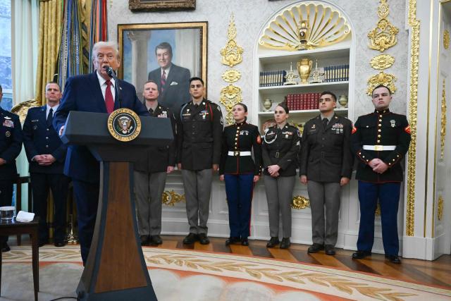 US President Donald Trump speaks during a Mexican Border Defense Medal presentation in the Oval Office of the White House in Washington, DC, on December 15, 2025. (Photo by ANDREW CABALLERO-REYNOLDS / AFP)