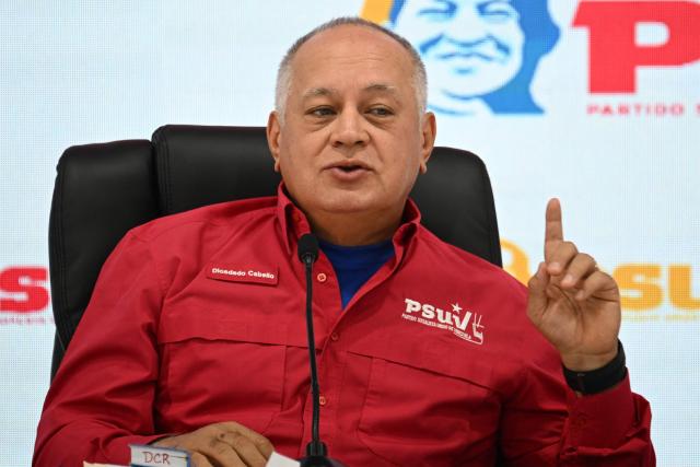 Venezuela's Minister of Interior Relations, Justice, and Peace, Diosdado Cabello, gestures as he speaks during a press conference of the United Socialist Party of Venezuela (PSUV) in Caracas, on December 15, 2025. (Photo by Federico PARRA / AFP)