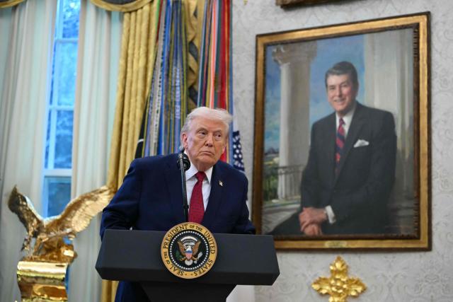 US President Donald Trump speaks during a Mexican Border Defense Medal presentation in the Oval Office of the White House in Washington, DC, on December 15, 2025. (Photo by ANDREW CABALLERO-REYNOLDS / AFP)