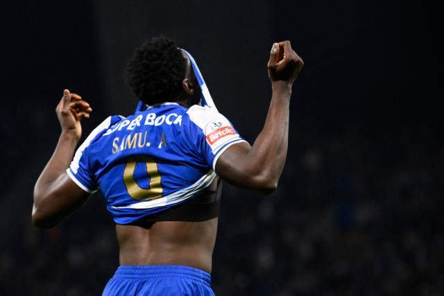 FC Porto's Spanish forward #09 Samuel Omorodion reacts after his goal was disallowed during the Portuguese league football match between FC Porto and CF Estrela da Amadora at Dragao stadium in Porto on December 15, 2025. (Photo by Miguel RIOPA / AFP)