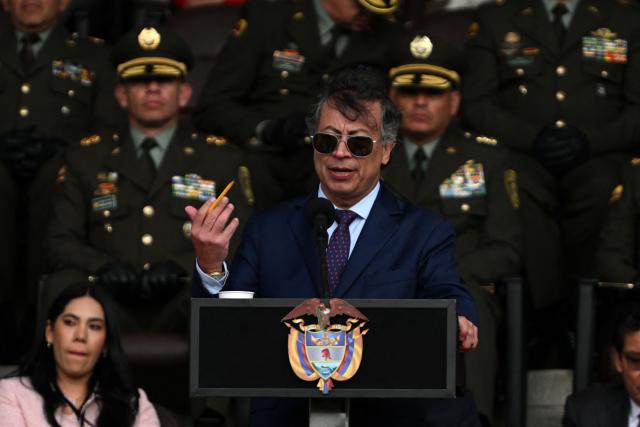 Colombia's President Gustavo Petro speaks during a promotion ceremony for senior officials at the General Santander Police Academy (ECSAN) in Bogota on December 15, 2025. (Photo by LUIS ACOSTA / AFP)