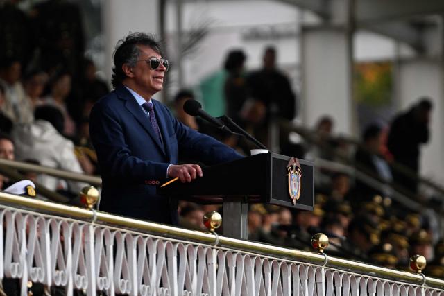 Colombia's President Gustavo Petro speaks during a promotion ceremony for senior officials at the General Santander Police Academy (ECSAN) in Bogota on December 15, 2025. (Photo by LUIS ACOSTA / AFP)