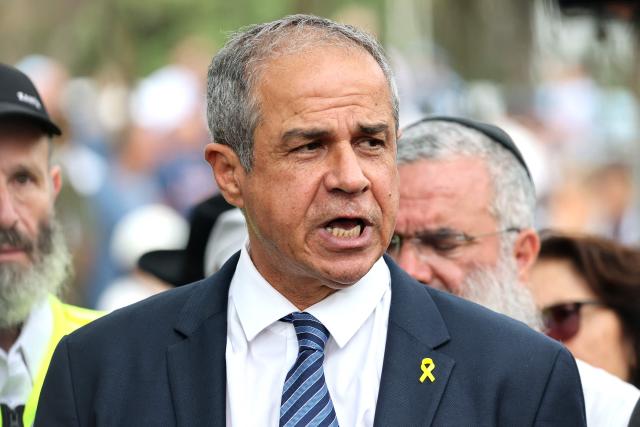 Israeli Ambassador to Australia Amir?Maimon speaks to the media at the Bondi Pavilion memorial in Sydney on December 16, 2025, after paying tribute to victims of the Bondi Beach shooting. A father-and-son team toting long-barrelled guns shot and killed 15 people including a 10-year-old girl at Sydney's Bondi Beach on December 14, with authorities labelling it an antisemitic terrorist attack on a Jewish festival. (Photo by DAVID GRAY / AFP)