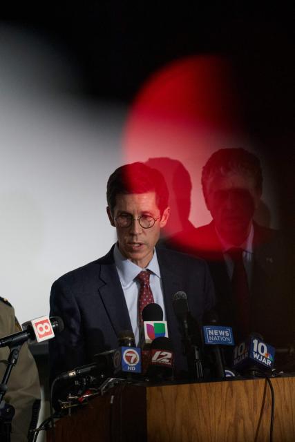 Providence Mayor Brett Smiley answers questions from reporters during a press conference into the ongoing investigation into the December 13 mass shooting at Brown University, at the Providence Public Safety Complex in Providence, Rhode Island, on December 15, 2025. A gunman remained at large after a weekend mass shooting at elite Brown University left two dead and nine wounded, with US authorities releasing new footage of a masked "person of interest" captured on surveillance cameras. The shooting took place Saturday in a building where exams were underway on the Ivy League campus in Providence, Rhode Island when a man with a rifle burst in and opened fire before fleeing. (Photo by Bing Guan / AFP)