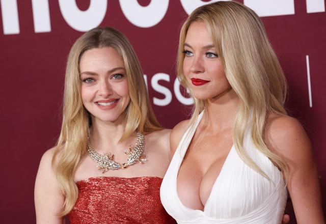 US actresses Amanda Seyfried (L) and Sydney Sweeney attend the LA premiere of Lionsgate's "The Housemaid" at the TCL Chinese theatre in Los Angeles, on December 15, 2025. (Photo by Patrick T. Fallon / AFP)