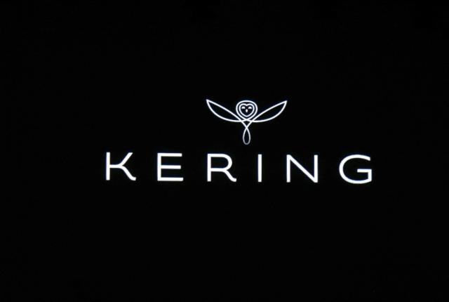 (FILES) A photo taken on June 18, 2013 shows the new name and logo of French luxury and retail group PPR , Kering, at an annual general meeting of the group in Paris during which shareholders agreed the group start a new life as a luxury and sports brands group by renaming itself Kering. The luxury group Kering (Gucci, Saint Laurent...) has signed an agreement “with immediate effect” with the investment firm Ardian to sell its building on New York’s famous Fifth Avenue for 766 million euros, the company announced on December 16, 2025. (Photo by FRANCOIS GUILLOT / AFP)