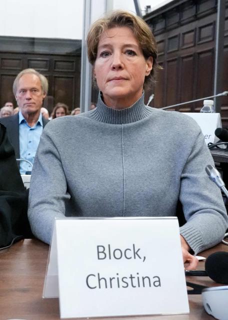 Defendant German entrepreneur and gastronome Christina Block (front) looks on as she sits in front of German former sports journalist Gerhard Delling (back L) ahead of the continuation of the trial against Christina Block over alleged child abduction at the District Court in Hamburg, northern Germany, on December 16, 2025. The public prosecutor's office accuses Block, heiress of a steakhouse chain, of ordering the abduction of her daughter, born in 2010, and her son, born in 2013. According to the indictment, the background to this is an escalating custody dispute over many years between Block and her former husband, who have four children together. The latter kept the two youngest children with him in August 2021 after an agreed visit to Gravenstein in southern Denmark near the German border, where he had been living for some time. (Photo by Marcus Brandt / POOL / AFP)