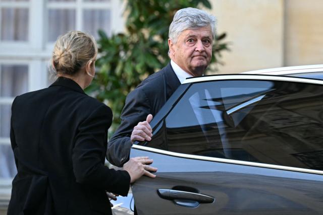 France’s junior Minister in charge of external trade Nicolas Forissier reacts as he leaves the Hotel Matignon after a meeting with The Prime Minister, government ministers and prefects on agricultural policy in Paris on December 16, 2025. The Prime Minister held a meeting on agriculture at the Hotel Matignon on December 16, 2025, as farmers criticize the government's handling of lumpy skin disease (dermatose nodulaire contagieuse) affecting livestock, and oppose the signing of a free trade agreement with Mercosur. (Photo by Blanca CRUZ / AFP)