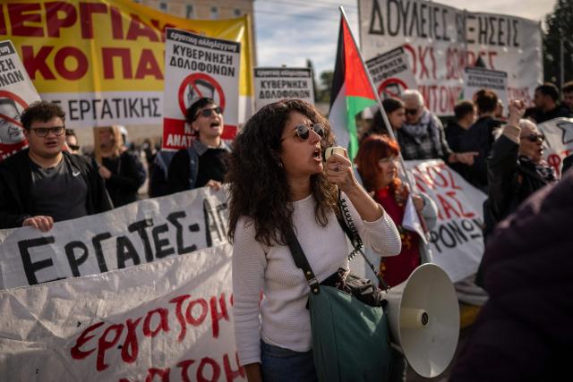 Greek public sector workers take part in a demonstration during a 24-hour strike against the 2026 budget undergoing government review, in Athens on December 16, 2025. (Photo by Aris MESSINIS / AFP)