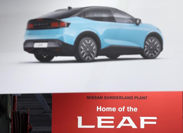 A sign is pictured during a media tour of the Nissan Leaf electric car production line, at the Nissan factory in Sunderland, north-east England, on December 16, 2025. (Photo by Scott Heppell / AFP)