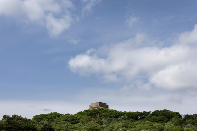 This photograph shows a general view of the Voortrekker Monument as Afrikaners gather to celebrate the Day of the Vow (Geloftedag) in Pretoria on December 16, 2025. The Day of the Vow (Geloftedag), which has since been renamed Reconciliation Day, is celebrated by traditional Afrikaners as the day they defeated the Zulu's at the Battle of Blood River, in KwaZulu Natal, on December 16, 1838. (Photo by Wikus de Wet / AFP)