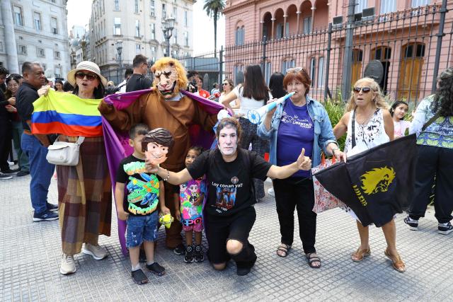 Supporters of Argentina's President Javier Milei demonstrate at Mayo Square, as they wait for the visit of Chile’s president-elect Jose Antonio Kast to the Casa Rosada government palace, in Buenos Aires, on December 16, 2025. (Photo by ALEJANDRO PAGNI / AFP)