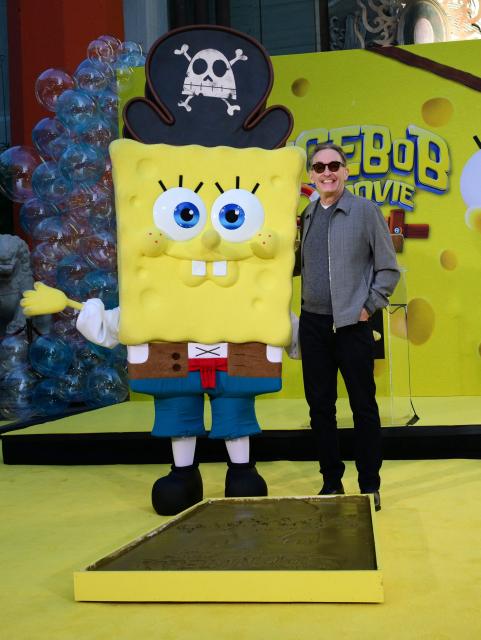 Tom Kenney, the voice of SpongeBob, attends the Hand and Footprints ceremony for SpongeBob on December 16, 2025 at the TCL Chinese Theater in Hollywood, California. (Photo by Frederic J. BROWN / AFP)