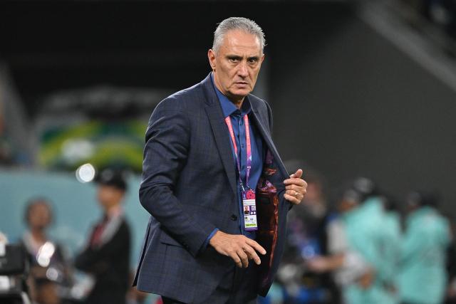 (FILES) Brazil's coach #00 Tite watches his players from the touchline during the Qatar 2022 World Cup quarter-final football match between Croatia and Brazil at Education City Stadium in Al-Rayyan, west of Doha, on December 9, 2022. Cruzeiro announced Tite, former coach of the Brazilian national team, as its new head coach, on December 16, 2025, with a contract until the end of 2026. (Photo by NELSON ALMEIDA / AFP)