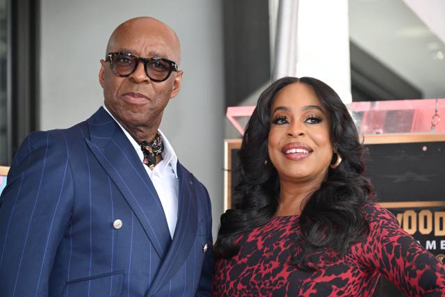 US actor Courtney B. Vance poses with US actress Niecy Nash-Betts during Vance's Hollywood Walk of Fame unveiling ceremony in Hollywood, California, on December 16, 2025. (Photo by Robyn Beck / AFP)