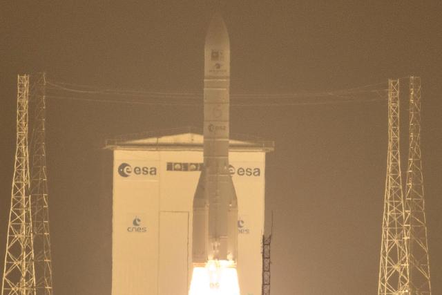 The European Space Agency (ESA) Ariane 6 rocket carrying two Galileo satellites for the the EU's Global Navigation Satellite System (GNSS) launches at the Guiana Space Centre in Kourou, on the French overseas department of Guiana, on December 17, 2025. (Photo by Ronan LIETAR / AFP)