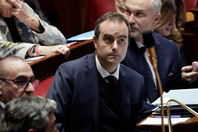 France's Prime Minister Sebastien Lecornu looks on during a session of questions to the government at the National Assembly, France's Parliament lower house, in Paris on December 17, 2025. (Photo by STEPHANE DE SAKUTIN / AFP)