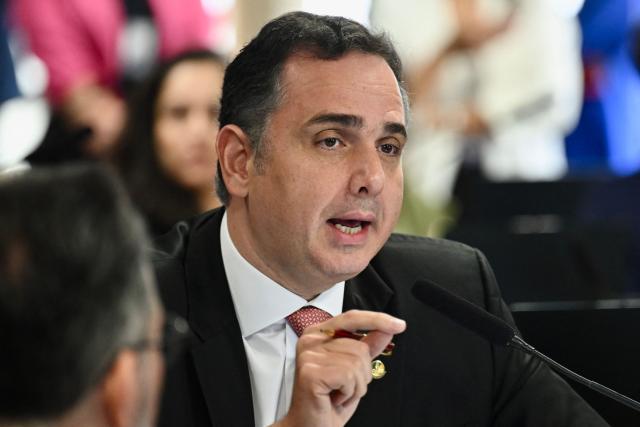 Senator Rodrigo Pacheco speaks during a session of the committee discussing the bill that reduces the sentences of those convicted of attempted coup d'etat in Brasilia, on December 17, 2025. Brazil's Senate is debating a bill passed by the lower house of Congress that could slash the jail term of former president Jair Bolsonaro, a move that sparked nationwide protests over the weekend. (Photo by Evaristo Sa / AFP)