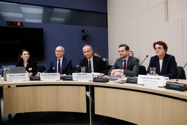 (from L) Louvre Museum's Chief Financial, Legal and Resources Officer Marie Lacambre,  Deputy director general Francis Steinbock, Director general Kim Pham, president's chief of cabinet Matthias Grolier and President Laurence des Cars sit prior to the start of a hearing before the Senate's culture committee at the French Senate in Paris on December 17, 2025. Des Cars and her predecessors face intense scrutiny over the running of the institution after an embarrassing daylight robbery in October 2025 that saw thieves make off with jewels worth $102 million. As well as the robbery, two other recent incidents have highlighted maintenance problems inside the building which chief architect has described as "not in a good state". (Photo by GEOFFROY VAN DER HASSELT / AFP)