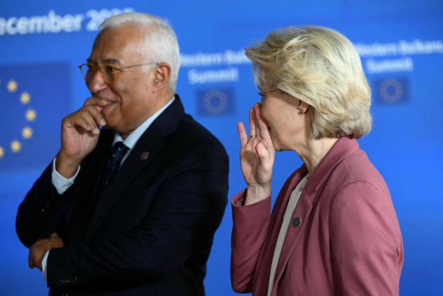 European Council President Antonio Costa (L) and Van European Commission President Ursula Von der Leyen (R) wait for the arrival of officials to attend the EU Western Balkans summit ahead of the European Council in Brussels on December 17, 2025. (Photo by NICOLAS TUCAT / AFP)