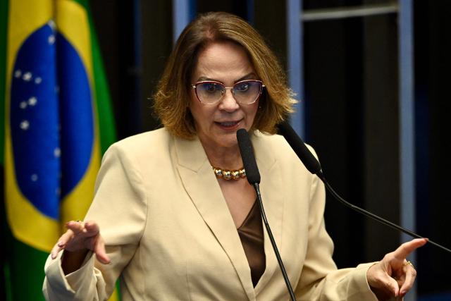 Brazilian Senator Damares Alves speaks during a session of the committee discussing the bill that reduces the sentences of those convicted of attempted coup d'etat in Brasilia, on December 17, 2025. Brazil's Senate is debating a bill passed by the lower house of Congress that could slash the jail term of former president Jair Bolsonaro, a move that sparked nationwide protests over the weekend. (Photo by Evaristo Sa / AFP)