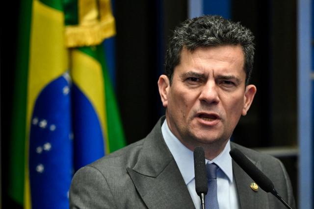 Brazilian Senator Sergio Moro speaks during a session of the committee discussing the bill that reduces the sentences of those convicted of attempted coup d'etat in Brasilia, on December 17, 2025. Brazil's Senate is debating a bill passed by the lower house of Congress that could slash the jail term of former president Jair Bolsonaro, a move that sparked nationwide protests over the weekend. (Photo by Evaristo Sa / AFP)