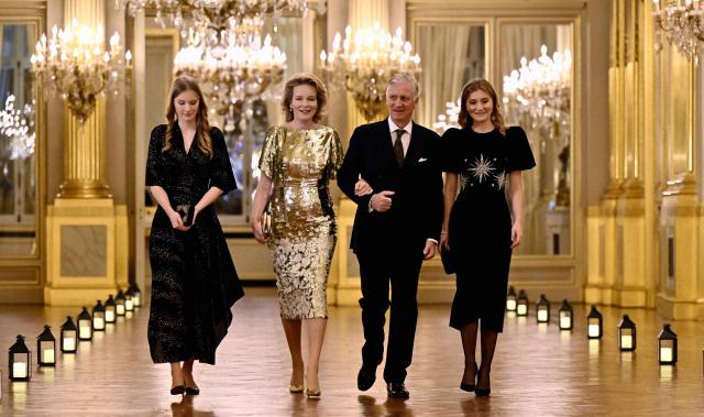 Crown Princess Elisabeth (L), Queen Mathilde of Belgium (CL), King Philippe - Filip of Belgium (CR) and Princess Eleonore (R) attend the annual Christmas Concert at the Royal Palace in Brussels on December 17, 2025. (Photo by ERIC LALMAND / Belga / AFP) / Belgium OUT