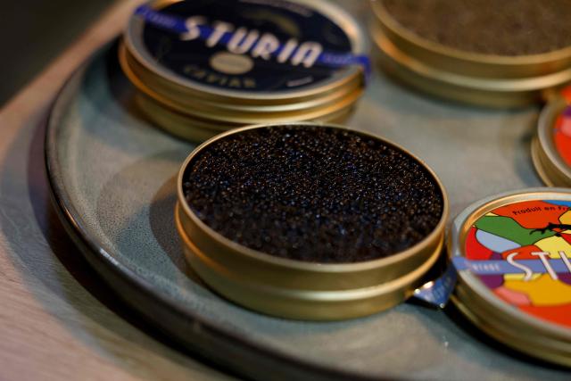 This photograph shows caviar displayed at the multinational wholesale chain 'Metro' flagship store in Nanterre during a press visit, in western Paris, on December 17, 2025. (Photo by Charlotte SIEMON / AFP)