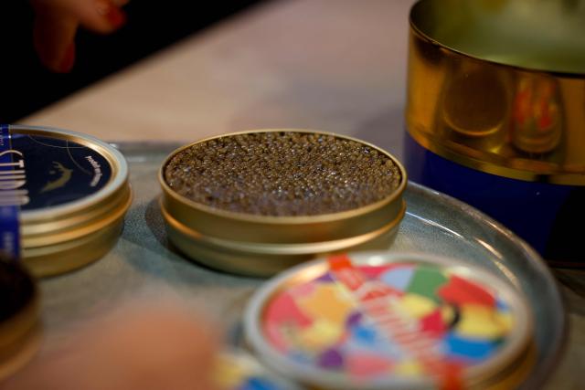 This photograph shows caviar displayed at the multinational wholesale chain 'Metro' flagship store in Nanterre during a press visit, in western Paris, on December 17, 2025. (Photo by Charlotte SIEMON / AFP)