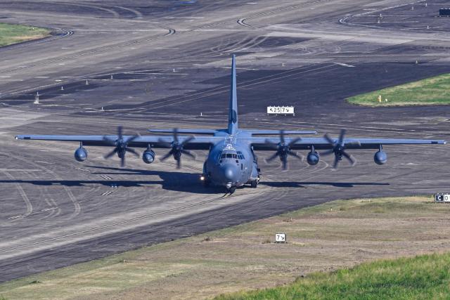 A US Air Force C-130 Hercules taxis at José Aponte de la Torre Airport, formerly Roosevelt Roads Naval Station, on December 17, 2025 in Ceiba, Puerto Rico. Aircraft movements and coordinated exercises were observed throughout the day as part of heightened regional military readiness linked to ongoing operations at US military bases and maritime security efforts in the Caribbean. President Donald Trump administration is conducting a military campaign in the Caribbean and eastern Pacific, deploying naval and air forces for what it calls an anti-drugs offensive. (Photo by Miguel J. Rodriguez Carrillo / AFP)