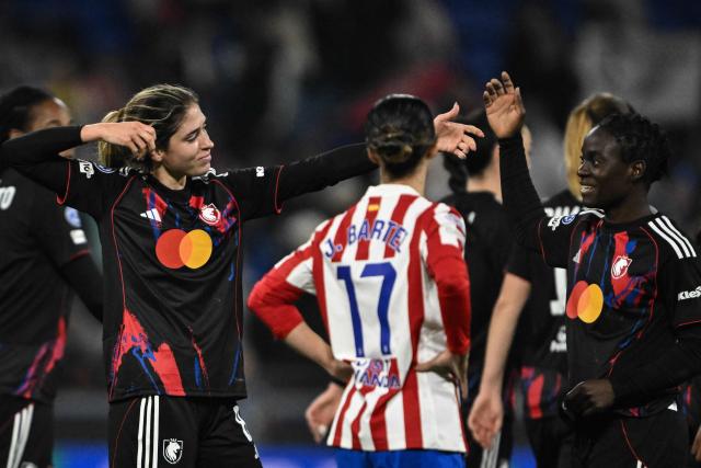 Lyon's US midfielder #08 Korbin Rose Shrader (L) celebrates after scoring Lyon's fourth goal during the UEFA Champions League group-stage football match between Olympique Lyonnais (OL) and Atlético Madrid at the Groupama Stadium in Decines-Charpieu, central-eastern France, on December 17, 2025. (Photo by JEFF PACHOUD / AFP)