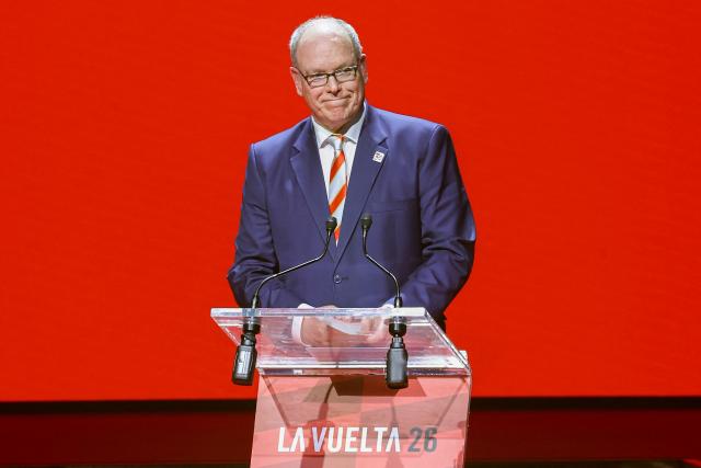 Prince's Albert II of Monaco addresses the audience during a ceremony to present the 81st edition of 'La Vuelta' cycling tour of Spain in Monaco on December 17, 2025. The 2026 Vuelta a Espana will start with a time-trial in Monaco and finish in Granada, after organisers on December 17, 2025 unveiled what they say will be one of the most difficult routes in the race's history. (Photo by Valery HACHE / AFP)