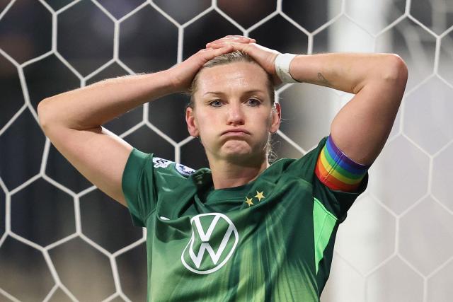 VfL Wolfsburg's German forward #11 Alexandra Popp reacts during the UEFA Women's Champions League football match VfL Wolfsburg vs Chelsea FC in Wolfsburg, northern Germany, on December 17, 2025. (Photo by Ronny HARTMANN / AFP)
