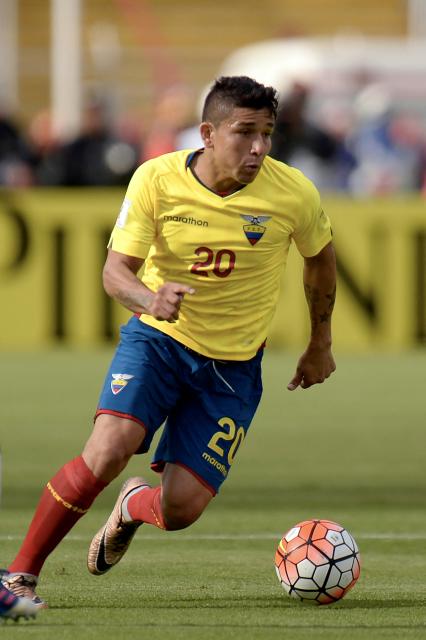 (FILES) Ecuador's defender Mario Pineida drives the ball during the 2018 FIFA World Cup qualifier football match against Colombia in Quito, on March 28, 2017. Ecuadorian footballer Mario Pineida was killed in an attack in the port city of Guayaquil on December 17, 2025, a hotspot for violence in the country due to drug trafficking, according to his club Ecuador's Barcelona. (Photo by Juan CEVALLOS / AFP)
