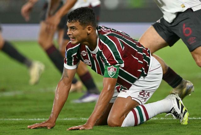 (FILES) Fluminense's defender #3 Thiago Silva reacts on the ground during the Copa Sudamericana quarterfinal second leg football match between Brazil's Fluminense and Argentina's Lanus at the Maracana Stadium in Rio de Janeiro, Brazil on September 23, 2025. Brazilian center-back Thiago Silva terminated his contract with Fluminense, the Rio de Janeiro club said on December 17, 2025, as the experienced defender is reportedly aiming to return to Europe according to local media. (Photo by Mauro PIMENTEL / AFP)