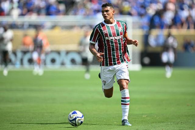 (FILES) Fluminense's Brazilian defender #03 Thiago Silva runs with the ball during the FIFA Club World Cup 2025 semifinal football match between Brazil's Fluminense and England's Chelsea at the MetLife stadium in East Rutherford, New Jersey on July 8, 2025. Brazilian center-back Thiago Silva terminated his contract with Fluminense, the Rio de Janeiro club said on December 17, 2025, as the experienced defender is reportedly aiming to return to Europe according to local media. (Photo by Paul ELLIS / AFP)
