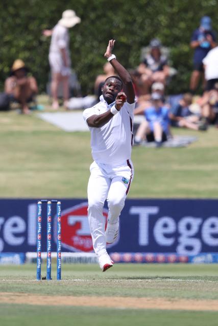 West Indies Jayden Seales bowls during day one of the 3rd international Test cricket match between New Zealand and West Indies at Bay Oval in Mount Maunganui on December 18, 2025. (Photo by Michael Bradley / AFP)