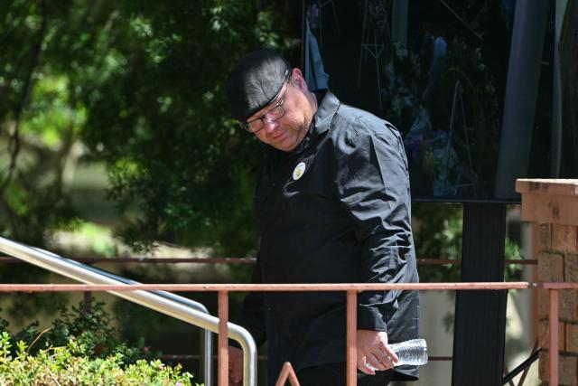 The father of 10-year-old Matilda, who was killed in the December 14 Bondi Beach shooting attack, arrives for her funeral in Sydney on December 18, 2025. The attack at Bondi Beach on December 14 was one of the deadliest in Australian history. (Photo by Saeed KHAN / AFP)