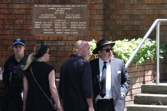 People arrive for the funeral of 10-year-old Matilda, who was killed in the December 14 Bondi Beach shooting attack, in Sydney on December 18, 2025. The attack at Bondi Beach on December 14 was one of the deadliest in Australian history. (Photo by DAVID GRAY / AFP)